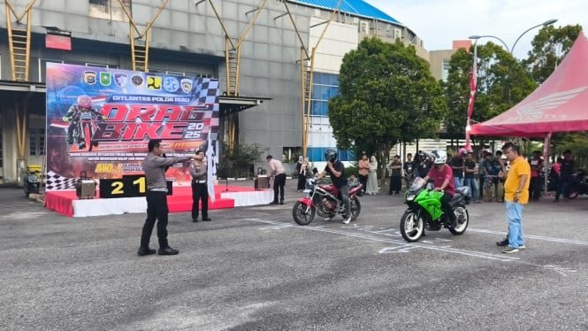 68be61b3d4ca9-polda-riau-gelar-drag-bike_665_374.jpg