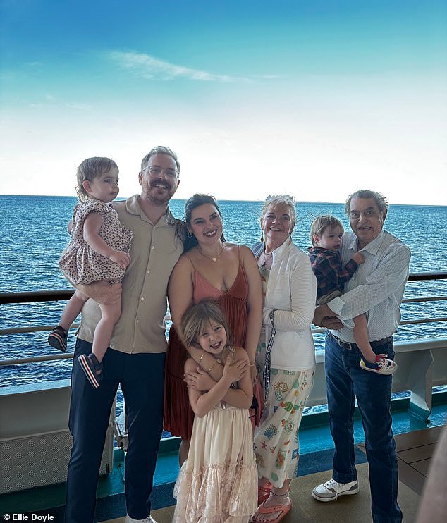 105355553-15447061-Ellie_with_her_family_and_her_parents_aboard_Royal_Caribbean_s_I-m-9_1768232138470.jpg