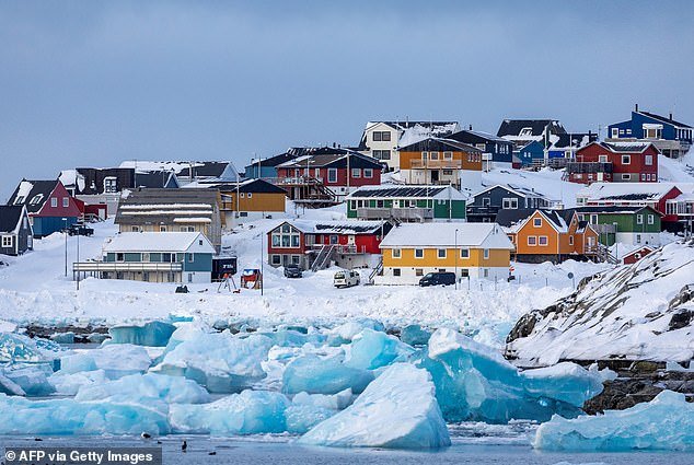 105387291-15450199-Colorful_houses_line_the_snowy_coast_of_Nuuk_the_capital_city_of-a-5_1768021738043.jpg