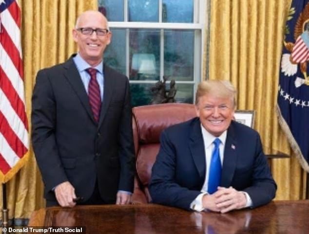 105478049-15460301-President_Donald_Trump_led_tributes_to_Dilbert_creator_Scott_Ada-m-33_1768325682314.jpg