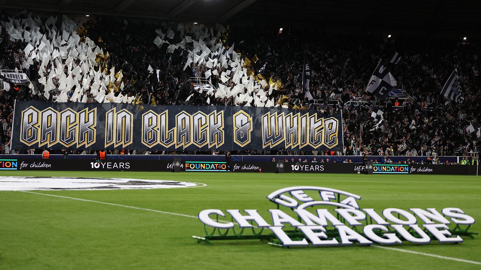 back-in-black-white-champions-league-banner-barcelona-2025-newcastle-united-nufc-2000.jpg